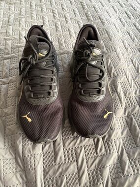 Puma Black Athletic Sneakers with Gold Puma Logos